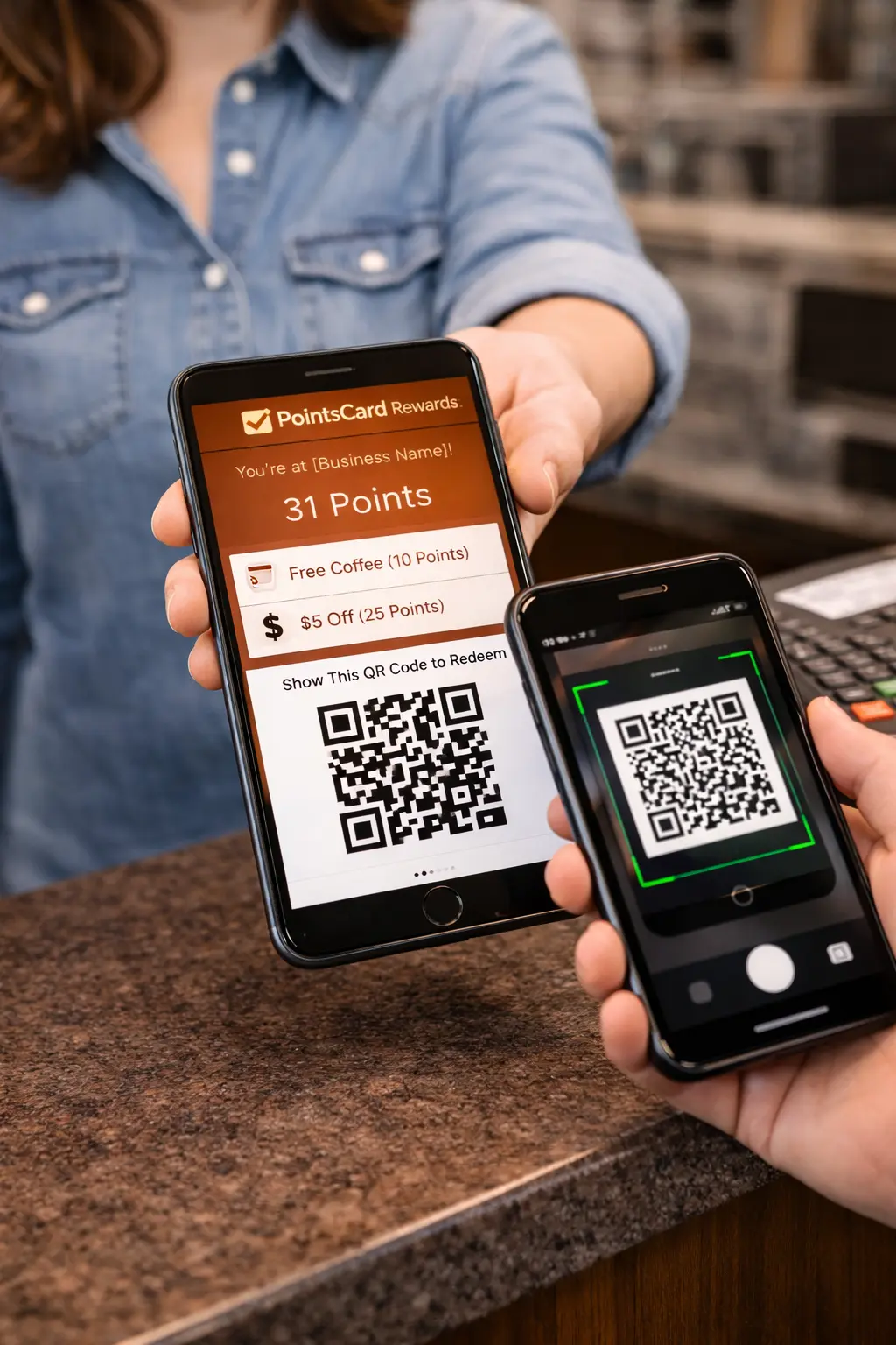 Staff member verifying redemption on customer's phone